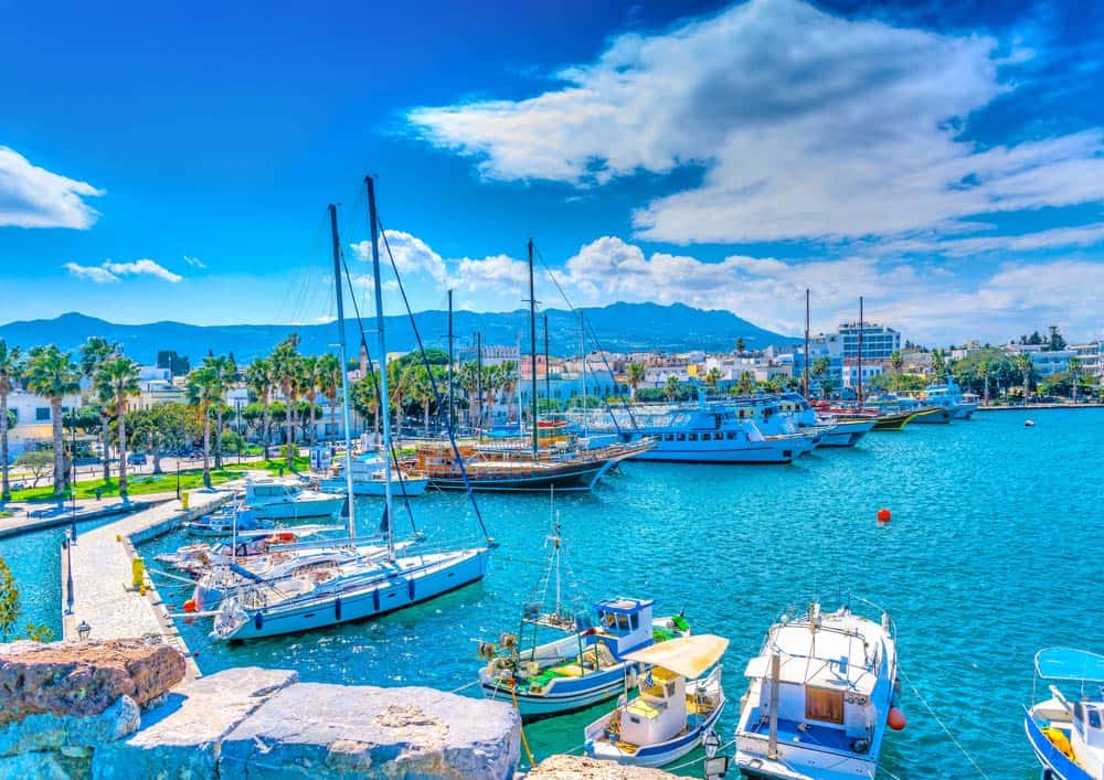 Sailboat anchored in a scenic Greek island harbor